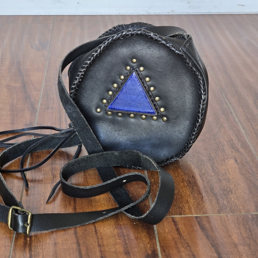 Black Leather Round Crossbody Bag with Blue Triangle Accent
